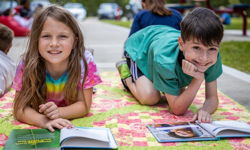 Students read books outside